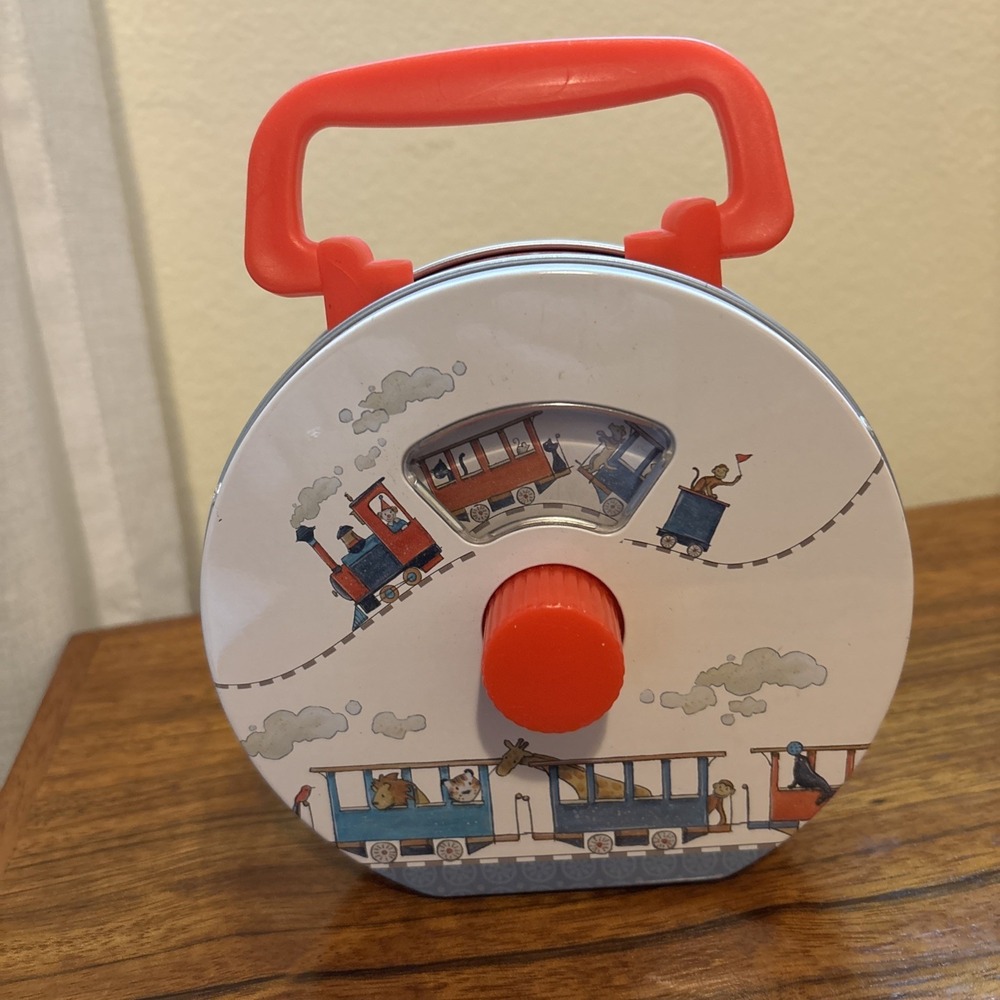 Egmont Musical Tin Radio Train Plays How Much Is That Doggie In The Window"